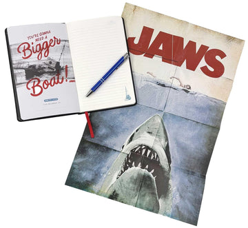 Notebook with 'Jaws' cover design and promotional text, featuring a shark and boat bonus poster. Jaws Hardcover Journal Hardcover 50th Anniversary Edition